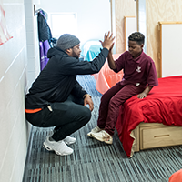 student in a dorm